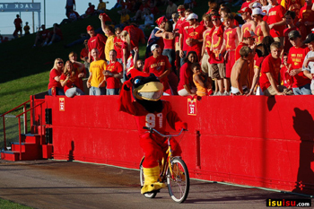 Cy on a bike