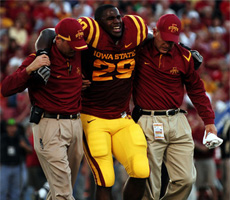 Rashawn Parker gets helped off the field after a left knee injury