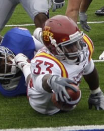 Alexander Robinson stretches for the end zone en route to a 2 TD game (AP Photo/ Orlin Wagner)