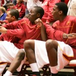 The Iowa State bench reacts during a nail biting win over Houston