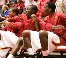 The Iowa State bench reacts during a nail biting win over Houston