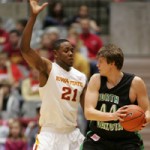 Craig Brackins plays defense on a North Dakota player