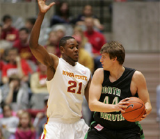 Craig Brackins plays defense on a North Dakota player