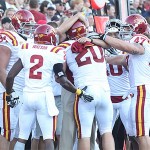 Jake Knott hugs Head Coach Paul Rhoads after sealing the victory with an interception